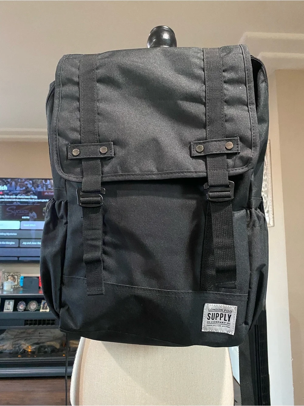 London Fog Black Canvas Flap Backpack with Buckle Straps